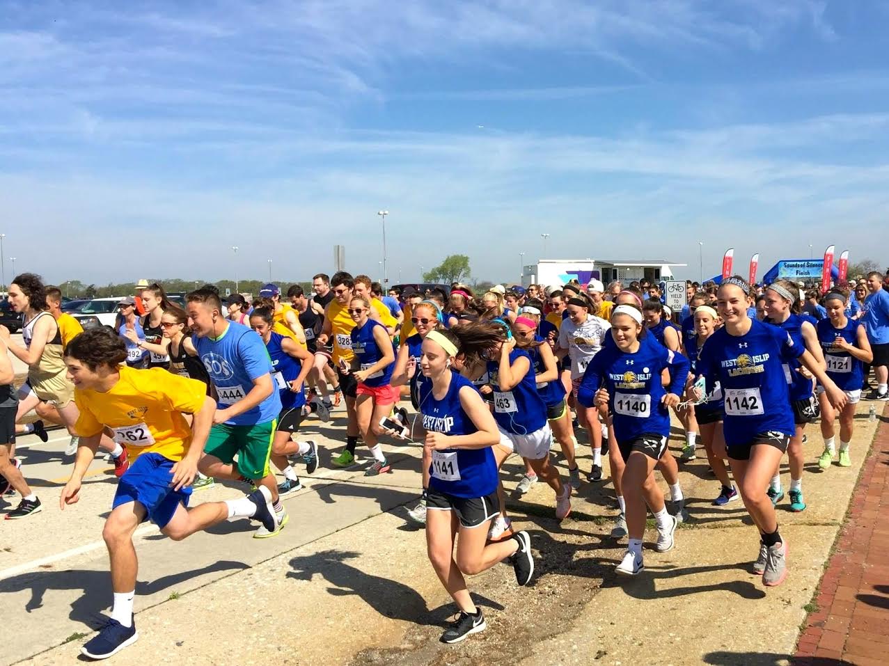 West Islip Lacrosse Players Run in Silence Team Up 4 Community