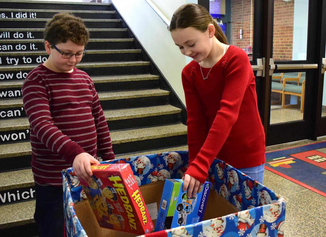 Toy drive is all about kids helping kids Team Up 4 Community