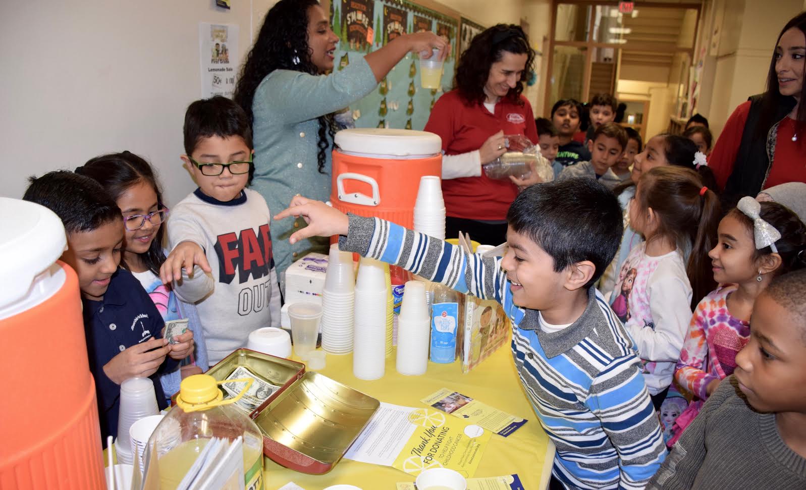 Lemonade turns to donations at Covert Avenue Team Up 4 Community