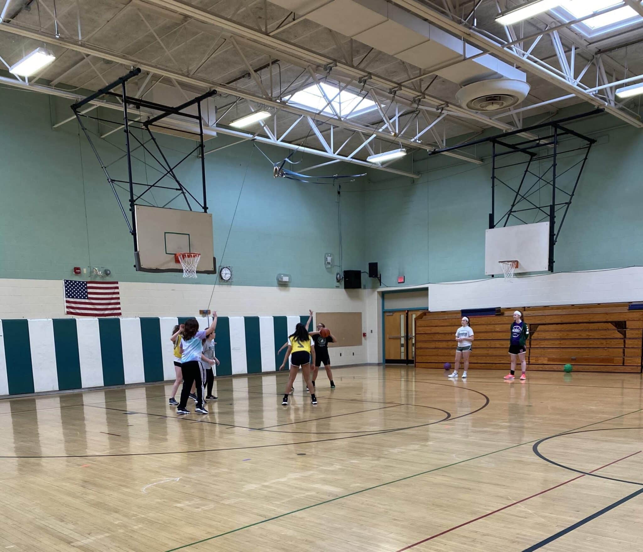 Minisink Valley girls varsity basketball volunteer at youth instructional basketball clinic