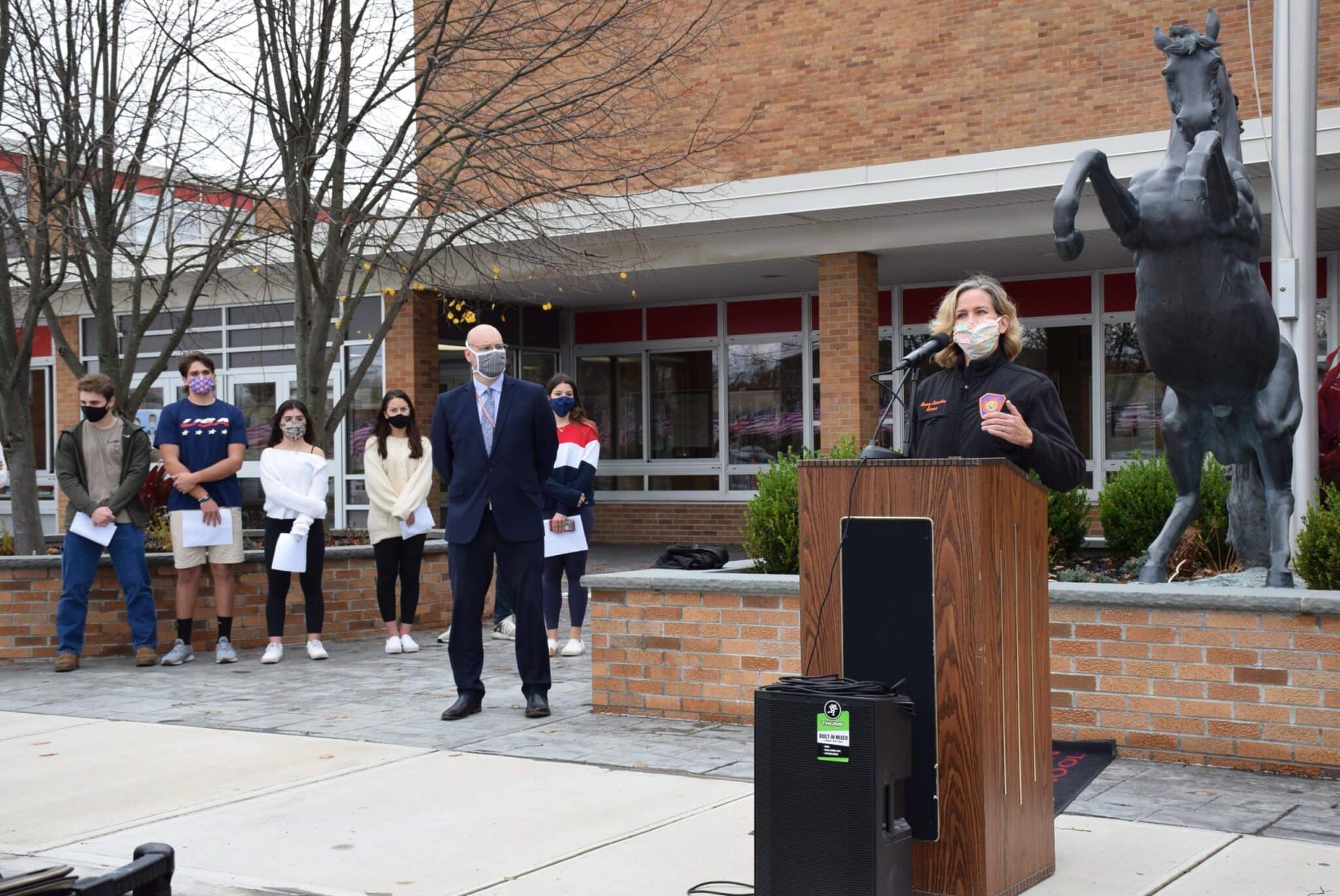 Mineola High School displays first Veteran Flag Field of Honor Team