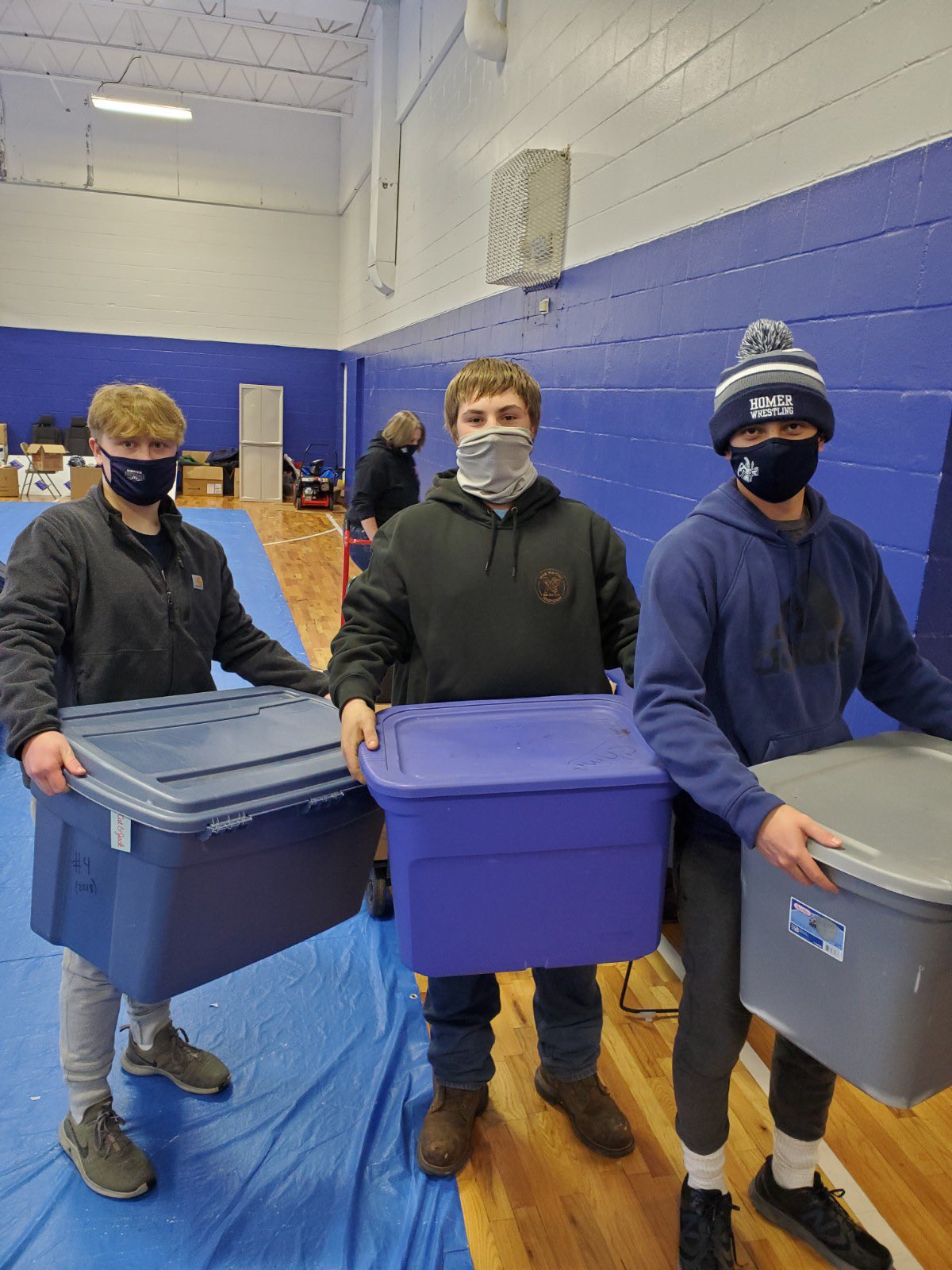 Homer Wrestling volunteers with Salvation Army Team Up 4 Community
