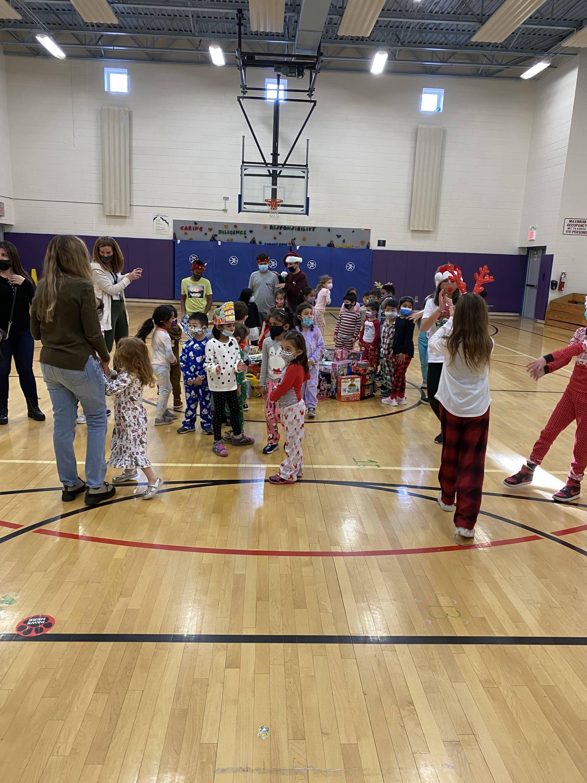 John Lewis Childs School hosts annual Toy Mountain event Team Up 4