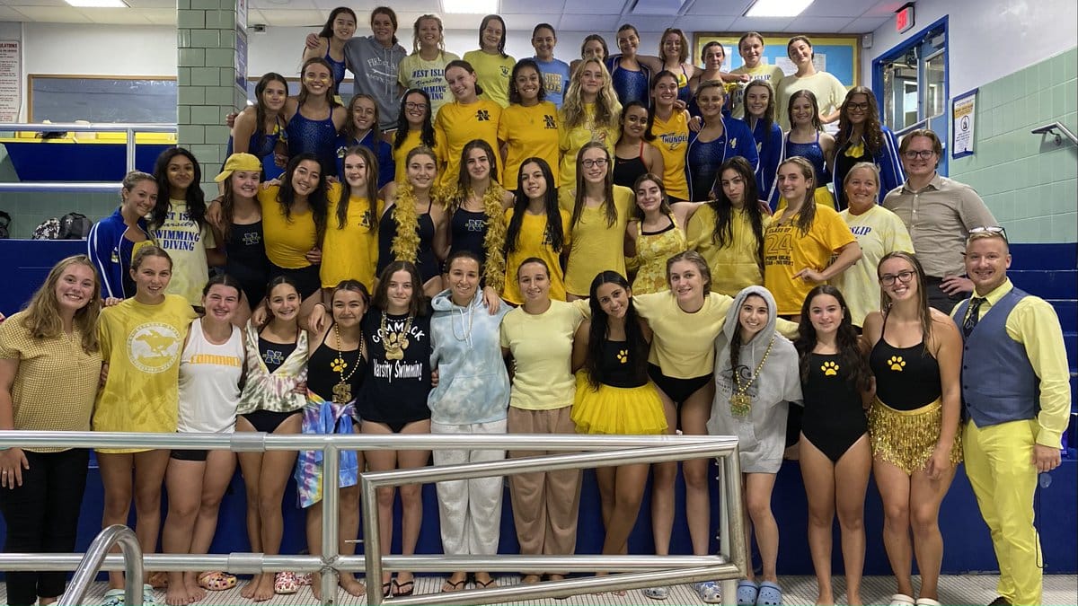 and West Islip Varsity Swim Teams had a goldthemed