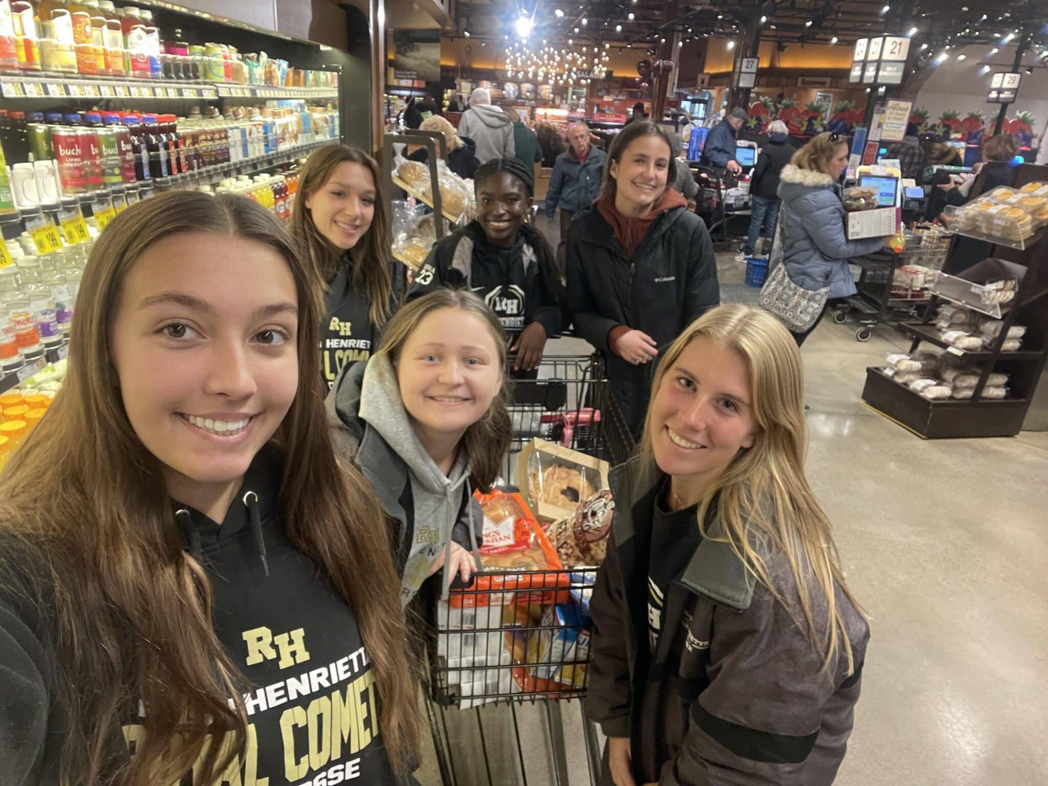 RushHenrietta Girls Lacrosse varsity team give back to the community