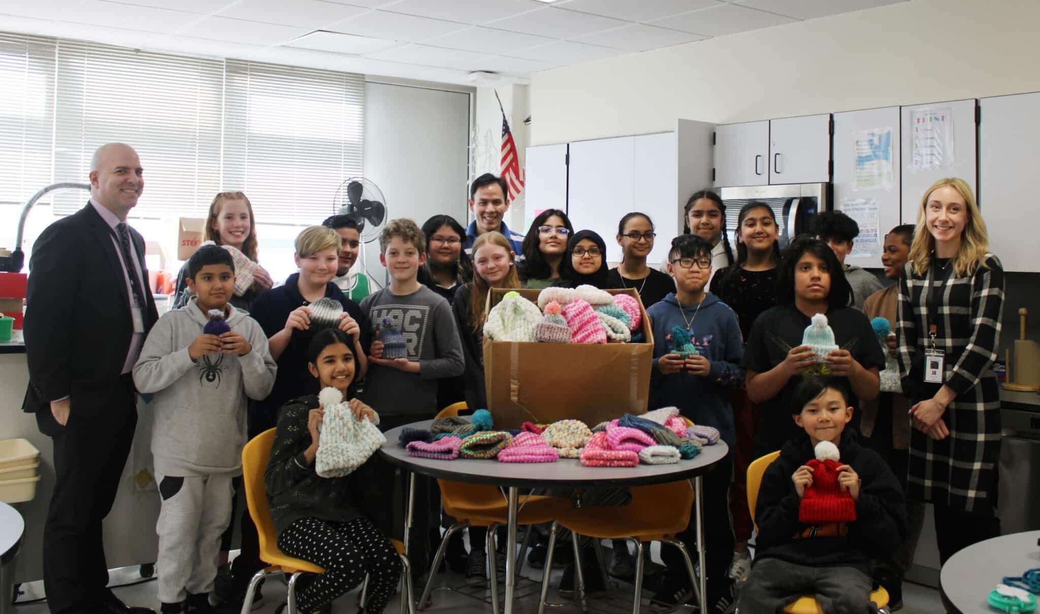 Hicksville Middle School students knit hats and warm hearts with